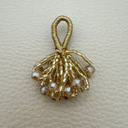 Gold crystal bead bunch latkan close-up showing metallic loop, gold bugle beads and clear faceted crystal drops